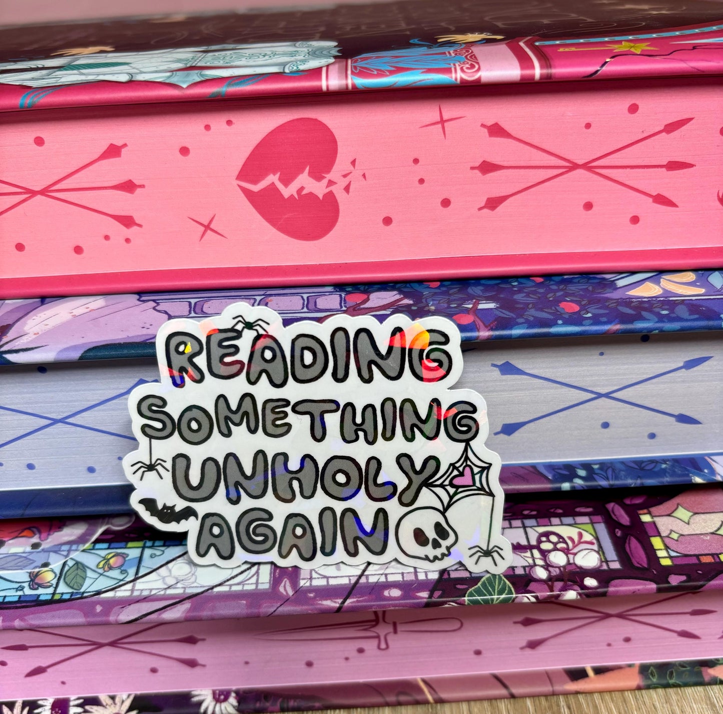 Reading Something Unholy Again Sticker