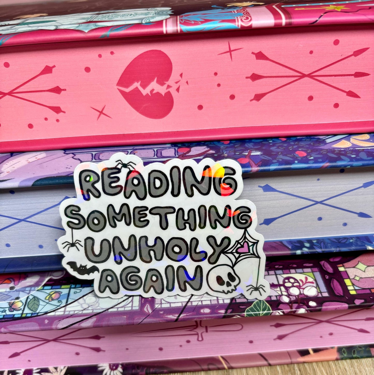 Reading Something Unholy Again Sticker
