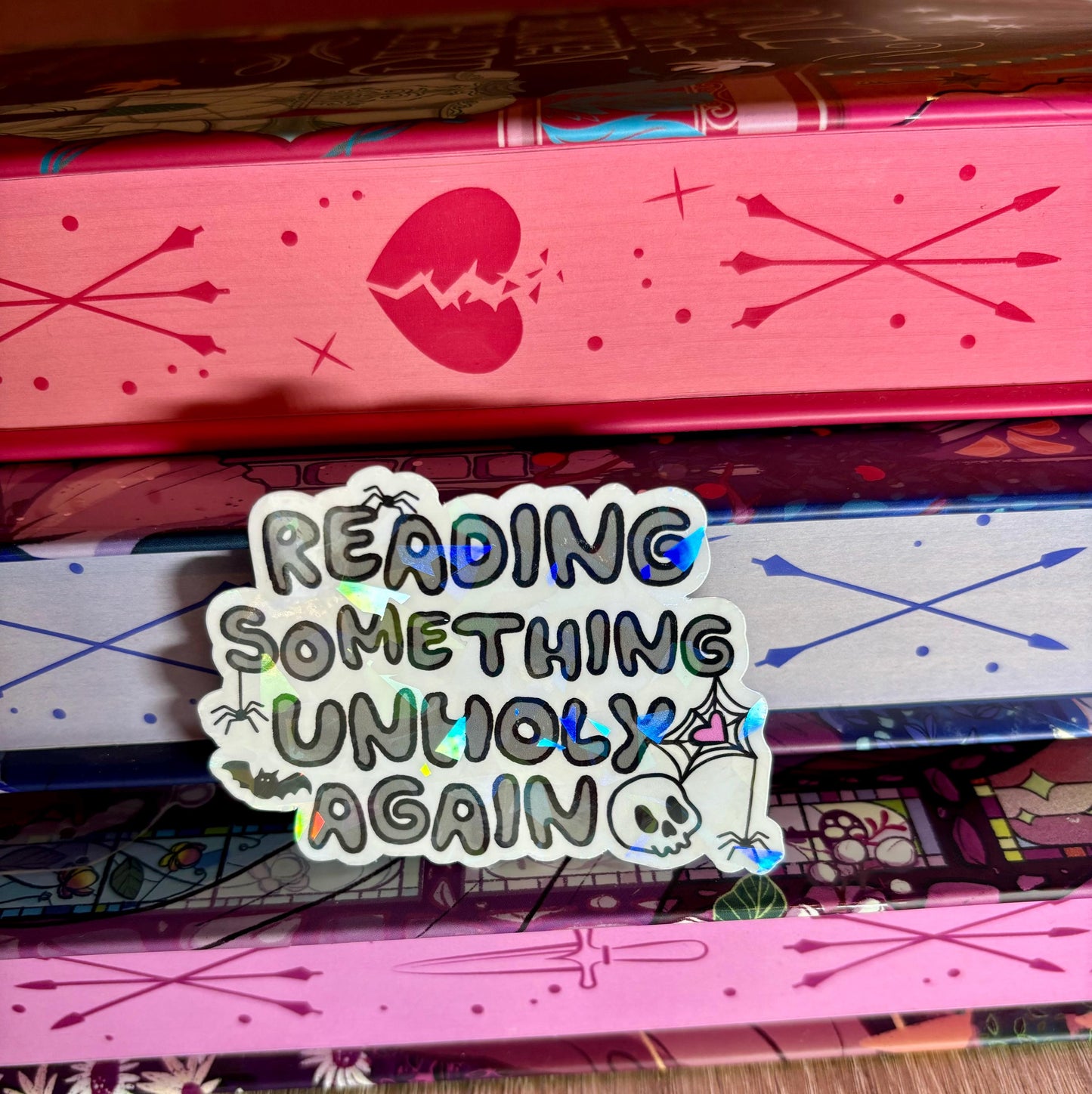 Reading Something Unholy Again Sticker