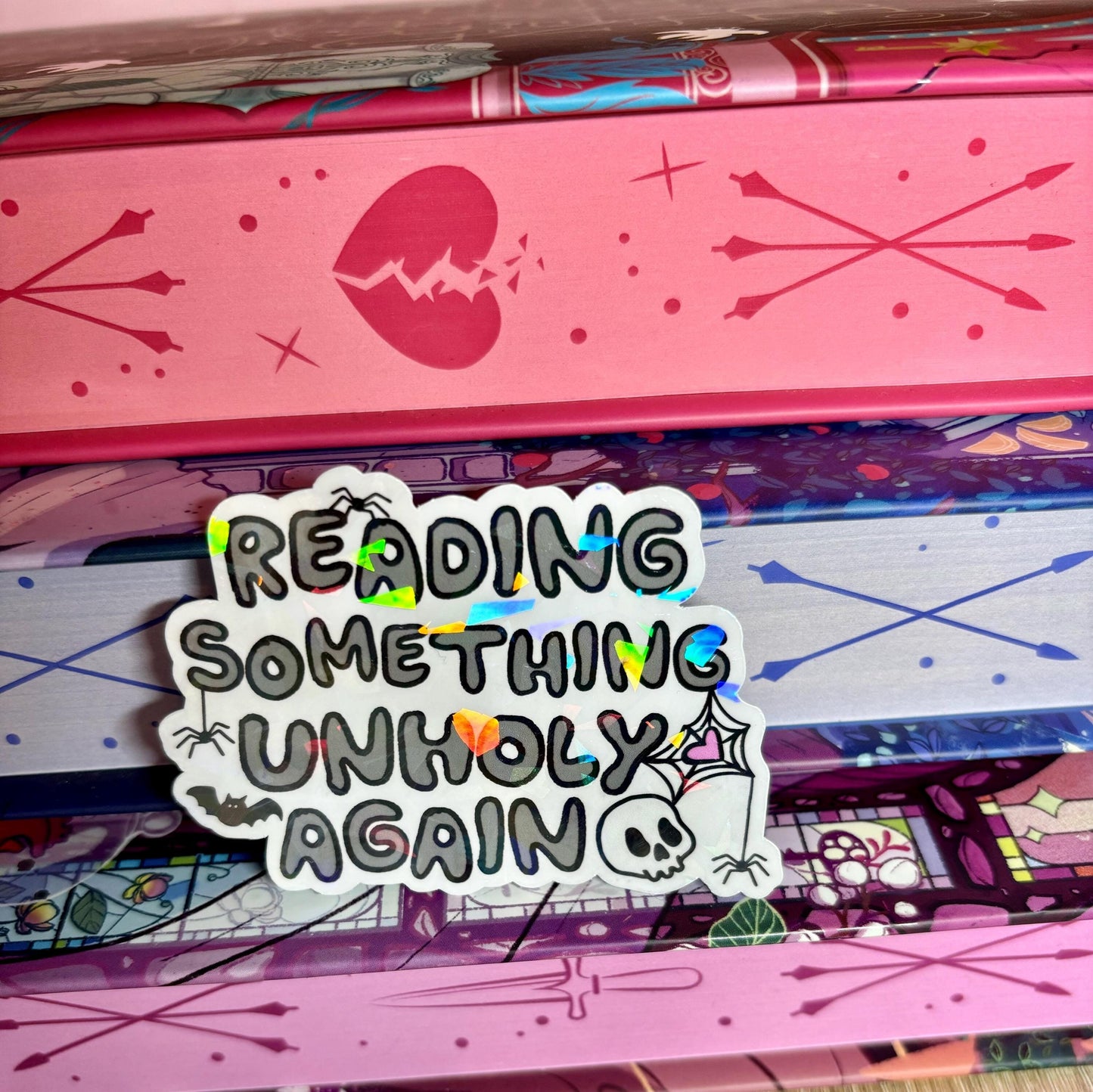 Reading Something Unholy Again Sticker