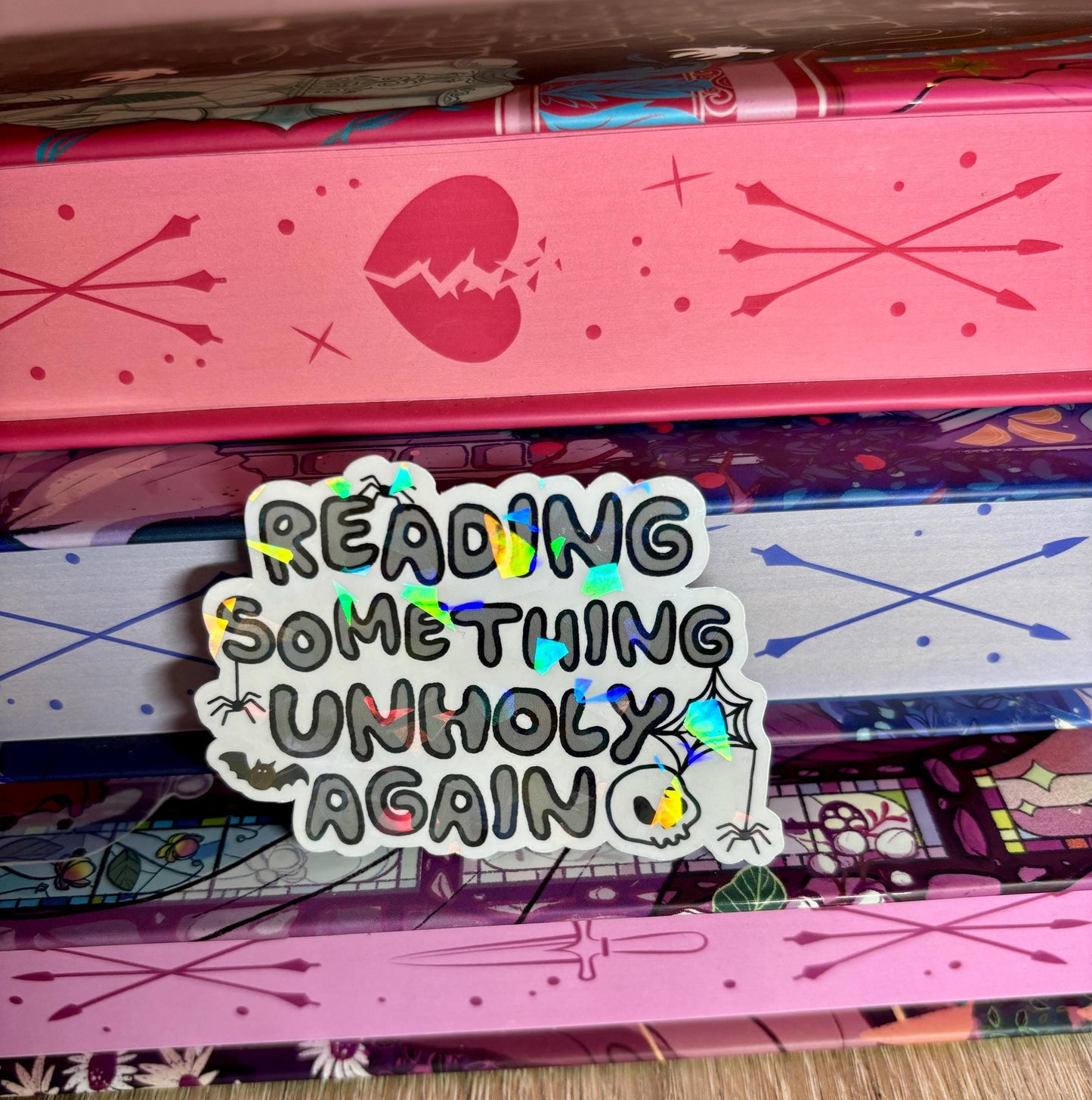 Reading Something Unholy Again Sticker