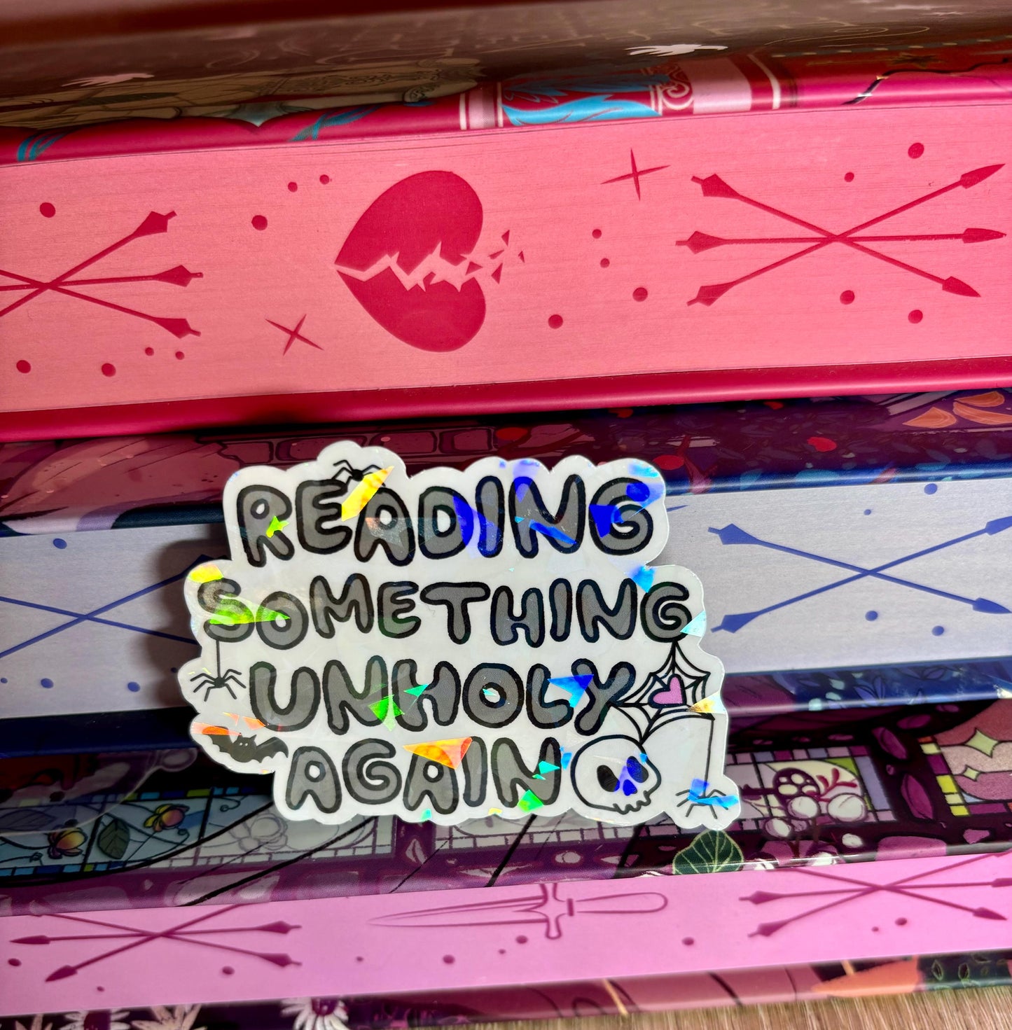 Reading Something Unholy Again Sticker