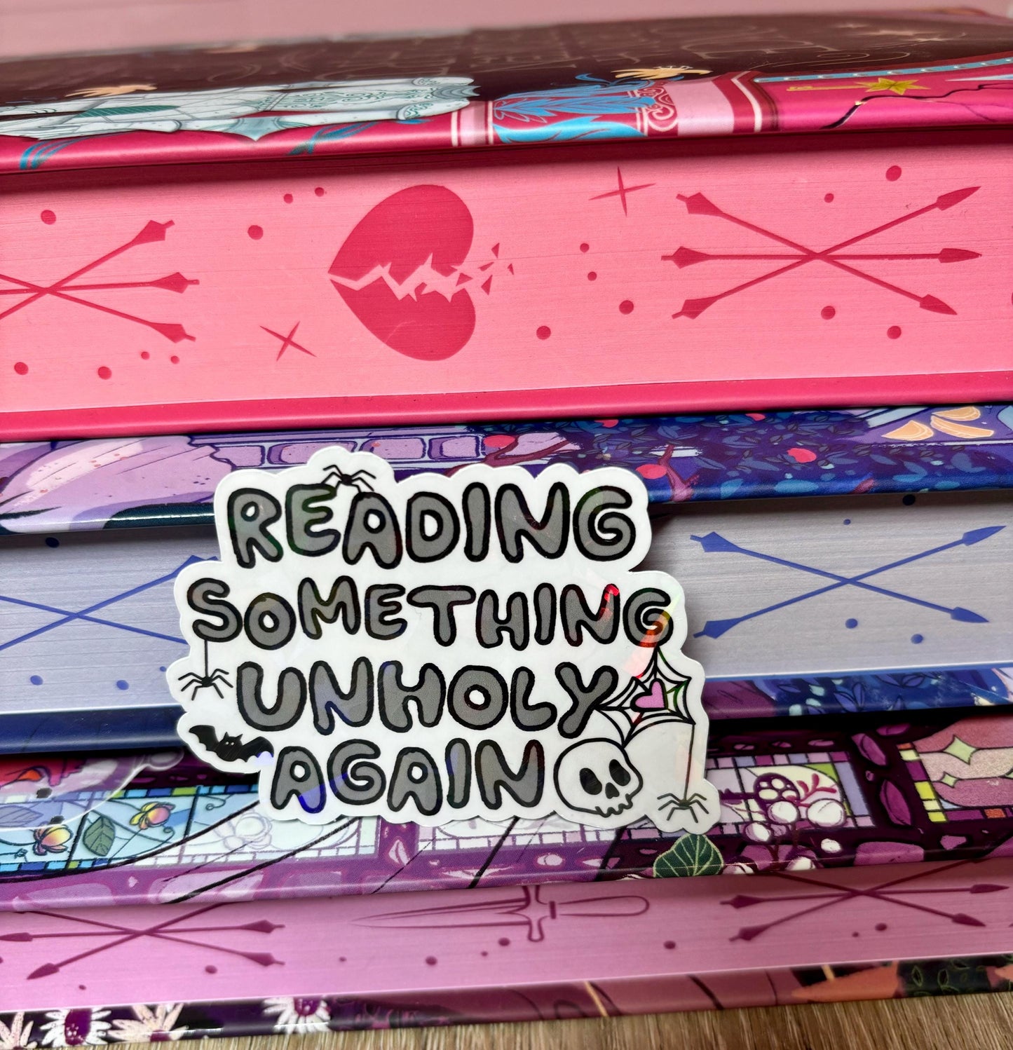 Reading Something Unholy Again Sticker